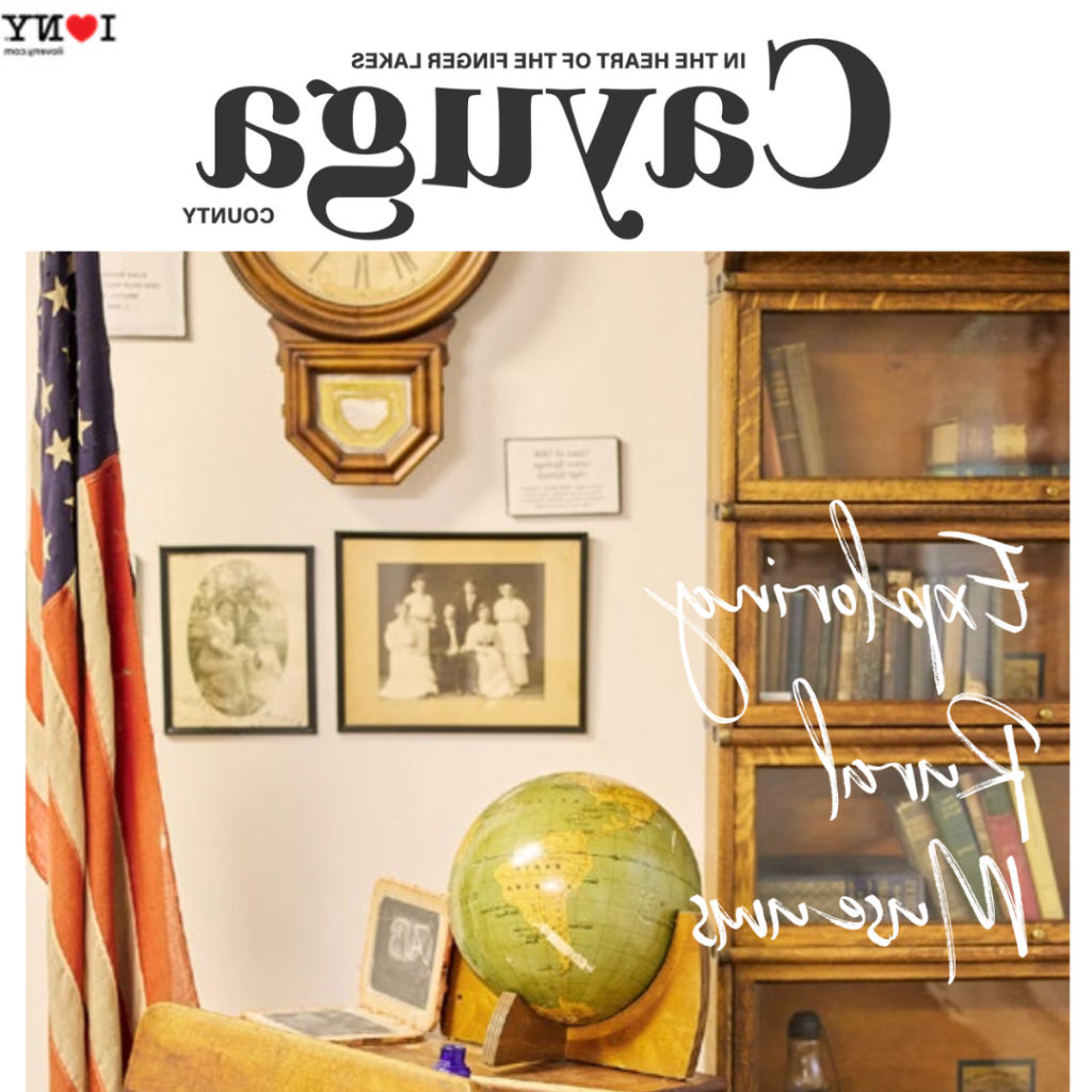 cover of Exploring Rural Museums magazine. picture shows an old desk and a round globe